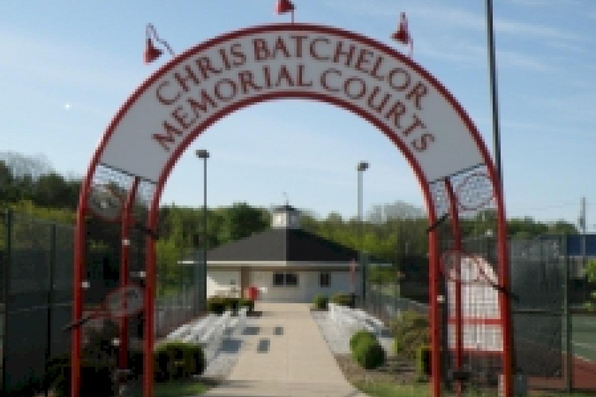 Photo of arch at entry with words "Christ Batchelor Memorial Courts"